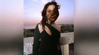 With the help of celebrity fashion stylist Leepakshi Ellawadi, Tamannaah accessorised her look with a pair of golden statement earrings. Hairstylist Daksh Nidhi assisted her in styling her locks into messy waves, leaving them open in the middle part. (Instagram/@tamannaahspeaks) With the help of celebrity fashion stylist Leepakshi Ellawadi, Tamannaah accessorised her look with a pair of golden statement earrings. Hairstylist Daksh Nidhi assisted her in styling her locks into messy waves, leaving them open in the middle part. (Instagram/@tamannaahspeaks)