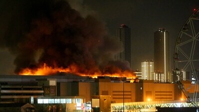A view shows the burning Crocus City Hall concert hall following the shooting incident in Krasnogorsk, outside Moscow, on March 22, 2024. (AFP) A view shows the burning Crocus City Hall concert hall following the shooting incident in Krasnogorsk, outside Moscow, on March 22, 2024. (AFP)