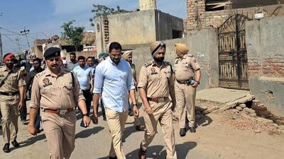 SIT head Gurinder Singh Dhillon (R) with Sangrur DC Jitendra Jorwal (centre) at Gujran village in Sangrur on Saturday. (HT Photo) SIT head Gurinder Singh Dhillon (R) with Sangrur DC Jitendra Jorwal (centre) at Gujran village in Sangrur on Saturday. (HT Photo)