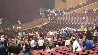 This grab taken from a UGC video shows gunmen shooting in a concert hall in Krasnogorsk, western edge of Moscow region. (X/ @SputnikInt) This grab taken from a UGC video shows gunmen shooting in a concert hall in Krasnogorsk, western edge of Moscow region. (X/ @SputnikInt)