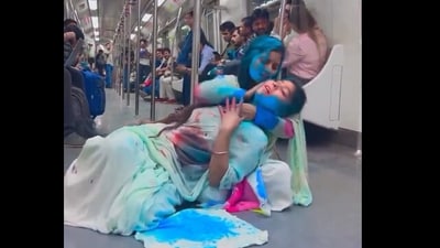 Snapshot of the women putting holi colours on each other. Snapshot of the women putting holi colours on each other.