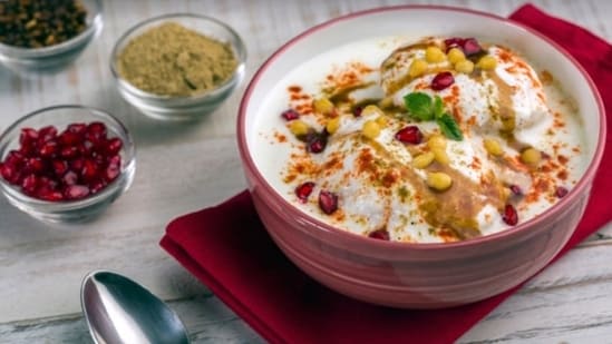 Dahi Vada (North India): A refreshing and tangy snack, Dahi Vada consists of lentil dumplings soaked in spiced yogurt and topped with chutneys and spices. This North Indian favorite adds a burst of flavors to your Holi spread.&nbsp;(File Photo)