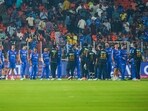 Players exchange handshakes after the match between Gujarat Titans and Mumbai Indians. Players exchange handshakes after the match between Gujarat Titans and Mumbai Indians.