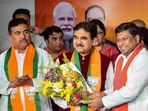 Former Calcutta High Court judge Justice Abhijit Gangopadhyay joins BJP. Former Calcutta High Court judge Justice Abhijit Gangopadhyay joins BJP.