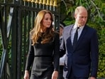 Britain's Prince William, second left, Kate, Princess of Wales, left, Britain's Prince Harry, second right, and Meghan, Duchess of Sussex view the floral tributes for the late Queen Elizabeth II outside Windsor Castle, in Windsor, England on Sept. 10, 2022. (AP Photo/Martin Meissner, File) Britain's Prince William, second left, Kate, Princess of Wales, left, Britain's Prince Harry, second right, and Meghan, Duchess of Sussex view the floral tributes for the late Queen Elizabeth II outside Windsor Castle, in Windsor, England on Sept. 10, 2022. (AP Photo/Martin Meissner, File)