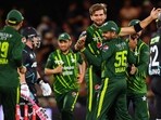 Pakistan's T20I captain Shaheen Shah Afridi (C) celebrates with former captain Babar Azam after the wicket of New Zealand's Tim Seifert during NZ T20I series Pakistan's T20I captain Shaheen Shah Afridi (C) celebrates with former captain Babar Azam after the wicket of New Zealand's Tim Seifert during NZ T20I series