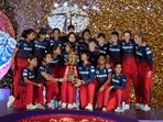 New Delhi: Royal Challengers Bangalore players celebrate with the trophy after winning the WPL-T20 final cricket match against Delhi Captals at the Arun Jaitley Stadium, in New Delhi, Sunday, March 17, 2024. (