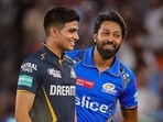 Mumbai Indians captain Hardik Pandya and Gujarat Titans' captain Shubman Gill during the toss Mumbai Indians captain Hardik Pandya and Gujarat Titans' captain Shubman Gill during the toss