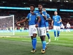 Brazil's Endrick celebrates scoring their first goal with Vinicius Junior 