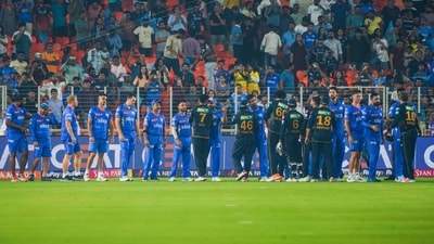 Players exchange handshakes after the match between Gujarat Titans and Mumbai Indians. (ANI) Players exchange handshakes after the match between Gujarat Titans and Mumbai Indians. (ANI)