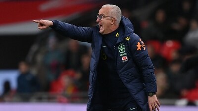 Brazil's head coach Dorival Junior gestures on the touchline during the international friendly football match between England and Brazil at Wembley stadium in north London (AFP)