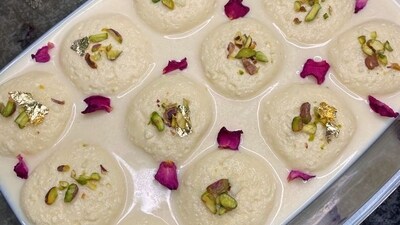 Composition: This decadent sweet treat features soft paneer dumplings soaked in sweetened, thickened milk infused with aromatic spices like cardamom and saffron, creating a luscious and flavorful dessert experience. (Pinterest) Composition: This decadent sweet treat features soft paneer dumplings soaked in sweetened, thickened milk infused with aromatic spices like cardamom and saffron, creating a luscious and flavorful dessert experience. (Pinterest)
