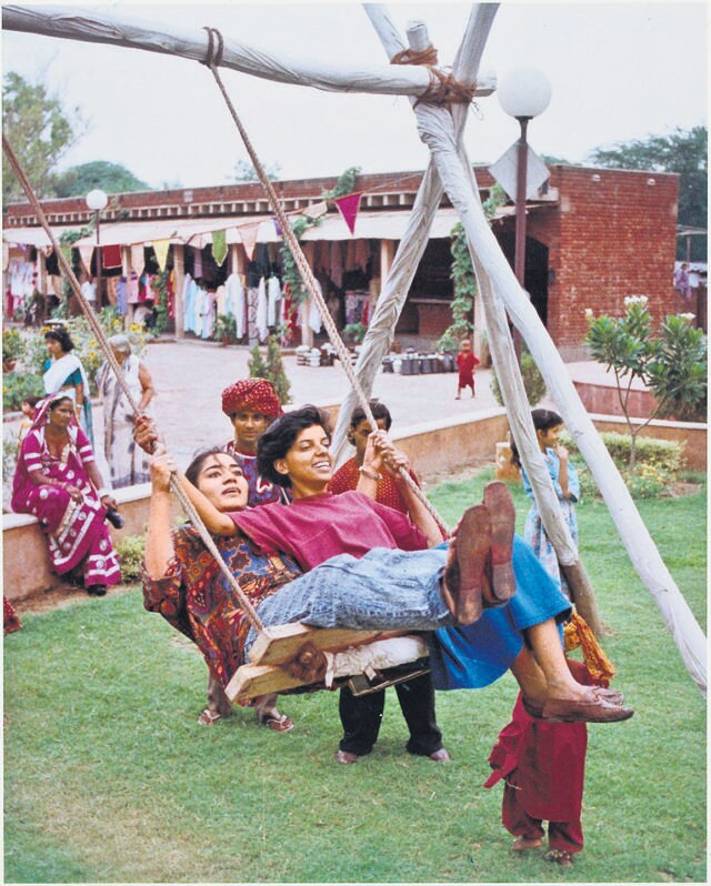 Two girls on a swing during the Teej festival celebrations at Dilli Haat in August 1997. (HT Archive) Two girls on a swing during the Teej festival celebrations at Dilli Haat in August 1997. (HT Archive)