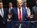 Former President Donald Trump speaks after hearing at New York Criminal Court, Monday, March 25, 2024, in New York. New York Judge Juan M. Merchan has scheduled an April 15 trial date in Trump's hush money case.