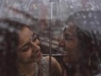 Pictures show Anjali Chakra from India and Sundas Malik from Pakistan under a rain-splattered umbrella. Pictures show Anjali Chakra from India and Sundas Malik from Pakistan under a rain-splattered umbrella.
