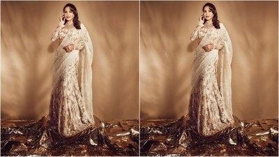 On Sunday, Madhuri gave her fans a weekend treat as the actress took to Instagram and uploaded a series of stunning pictures accompanied by the caption "Sparkle like you mean it". In the post, she is seen looking ravishing in a golden lehenga ensemble and oozing glamour. (Instagram/@madhuridixitnene) On Sunday, Madhuri gave her fans a weekend treat as the actress took to Instagram and uploaded a series of stunning pictures accompanied by the caption "Sparkle like you mean it". In the post, she is seen looking ravishing in a golden lehenga ensemble and oozing glamour. (Instagram/@madhuridixitnene)