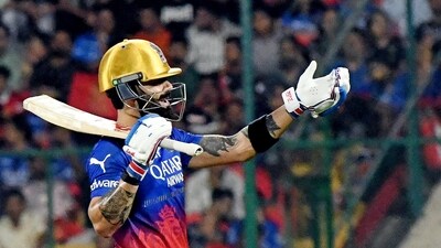 Virat Kohli scored 77 off 49 but it needed some typically brilliant finishing touches from Dinesh Karthik as RCB beat PBKS by four wickets in their first home match of the season. PBKS scored 176/6 batting first and Karthik finished unbeaten on 28 off 10 balls, hitting the winning runs in the last over with a four. (ANI ) Virat Kohli scored 77 off 49 but it needed some typically brilliant finishing touches from Dinesh Karthik as RCB beat PBKS by four wickets in their first home match of the season. PBKS scored 176/6 batting first and Karthik finished unbeaten on 28 off 10 balls, hitting the winning runs in the last over with a four. (ANI )