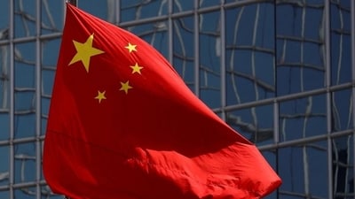 The Chinese national flag is seen in Beijing, China. Software provided by companies including Microsoft Corp. will be replaced by China, it was reported. (Reuters)