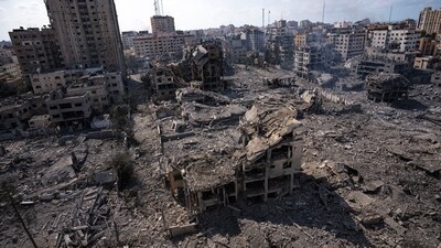 A view of the rubble of buildings hit by an Israeli airstrike in Gaza city. (AP) A view of the rubble of buildings hit by an Israeli airstrike in Gaza city. (AP)