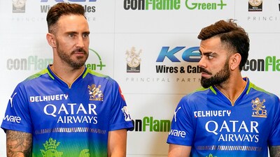 Faf du Plessis with teammates Virat Kohli and Mohammed Siraj during the launch of RCB's green jersey (PTI) Faf du Plessis with teammates Virat Kohli and Mohammed Siraj during the launch of RCB's green jersey (PTI)