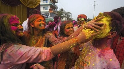 In Nagaon, people come together to partake in the colorful festivities that mark this joyous occasion.&nbsp; (PTI)