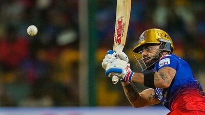 RCB got off to a quick start almost entirely thanks to Virat Kohli in the powerplay. Kohli smashed 35 in 21 balls after being dropped off the second ball of the innings by Jonny Bairstow and RCB were 50/2 at the end of the powerplay (PTI) RCB got off to a quick start almost entirely thanks to Virat Kohli in the powerplay. Kohli smashed 35 in 21 balls after being dropped off the second ball of the innings by Jonny Bairstow and RCB were 50/2 at the end of the powerplay (PTI)