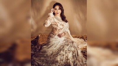 With the help of celebrity fashion stylist Mohit Rai, Madhuri accessorised her look with a luxurious multi-layered diamond necklace, several statement-making rings that adorned her fingertips and a pair of oversized stud earrings. (Instagram/@madhuridixitnene) With the help of celebrity fashion stylist Mohit Rai, Madhuri accessorised her look with a luxurious multi-layered diamond necklace, several statement-making rings that adorned her fingertips and a pair of oversized stud earrings. (Instagram/@madhuridixitnene)