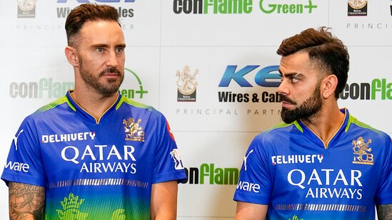 Faf du Plessis with teammates Virat Kohli and Mohammed Siraj during the launch of RCB's green jersey (PTI)