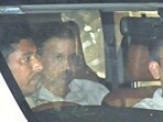 ED officials taking Kejriwal to the agency’s headquarters hours after arresting him. (ANI) ED officials taking Kejriwal to the agency’s headquarters hours after arresting him. (ANI)
