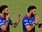 Virat Kohli was seen on a video call after the PBKS match. Virat Kohli was seen on a video call after the PBKS match.