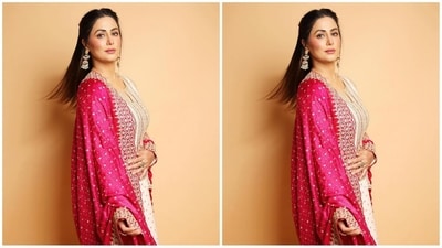 She styled her shoulder-length, lush locks into a centre parting and pinned a section of her hair back, leaving a flick that framed her face beautifully from the front. (Instagram/@realhinakhan) She styled her shoulder-length, lush locks into a centre parting and pinned a section of her hair back, leaving a flick that framed her face beautifully from the front. (Instagram/@realhinakhan)