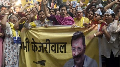 Delhi Education Minister Atishi holds a candle light march and protest march against the arrest of Delhi CM Arvind Kejriwal at Govindpuri in New Delhi. (HT Photo) Delhi Education Minister Atishi holds a candle light march and protest march against the arrest of Delhi CM Arvind Kejriwal at Govindpuri in New Delhi. (HT Photo)