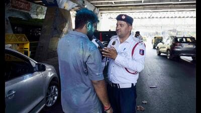 Delhi Traffic Police officials checking for drunk drivers during Holi celebrations in New Delhi on Monday. (HT PHOTO) Delhi Traffic Police officials checking for drunk drivers during Holi celebrations in New Delhi on Monday. (HT PHOTO)