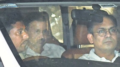 ED officials taking Kejriwal to the agency’s headquarters hours after arresting him. (ANI) ED officials taking Kejriwal to the agency’s headquarters hours after arresting him. (ANI)