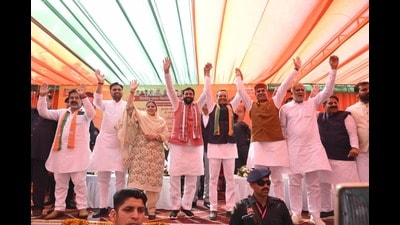 Haryana chief minister Nayab Singh Saini with BJP LS candidate from Kurukshetra Naveen Jindal during the election campaign in Kaithal on Tuesday. (HT Photo) Haryana chief minister Nayab Singh Saini with BJP LS candidate from Kurukshetra Naveen Jindal during the election campaign in Kaithal on Tuesday. (HT Photo)