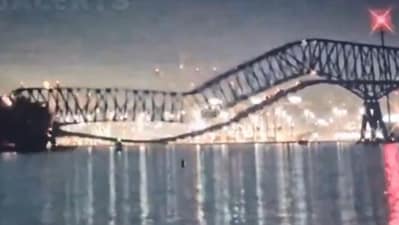 A video shows a Baltimore bridge collapsing after being struck by a ship (@rawsalerts/X) A video shows a Baltimore bridge collapsing after being struck by a ship (@rawsalerts/X)