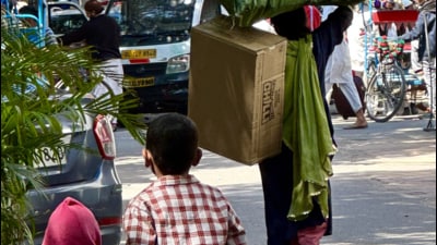 Shabana is on a road with her children following her. (HT Photo) Shabana is on a road with her children following her. (HT Photo)