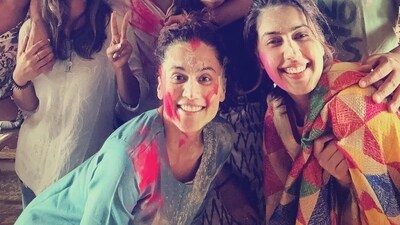Taapsee Pannu with sister Shagun Pannu during a Holi celebration with friends.