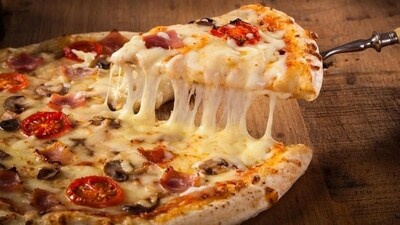 Greasy or high-fat foods like pizza: Greasy, heavy, fatty foods would make your stomach work overtime throughout the night, resulting in disturbed sleep and a sluggish morning. Fast food, nuts, ice cream and foods that have a lot of cheese are a big no no. (Shutterstock) Greasy or high-fat foods like pizza: Greasy, heavy, fatty foods would make your stomach work overtime throughout the night, resulting in disturbed sleep and a sluggish morning. Fast food, nuts, ice cream and foods that have a lot of cheese are a big no no. (Shutterstock)