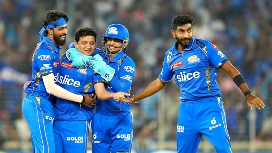 Mumbai Indians' Piyush Chawla and teammates celebrate the dismissal of Gujarat Titans' captain Shubman Gill in the Indian Premier League (IPL) 2024, at Narendra Modi Stadium in Ahmedabad (ANI)