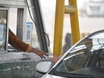 Paytm FASTag: Car seen at Gurugram-Faridabad road toll plaza near Bandhwari village, in Gurugram, India.