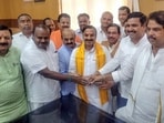 BJP's Pralhad Joshi and Basavaraj Bommai with Janata Dal (Secular) Karnataka President HD Kumaraswamy. BJP's Pralhad Joshi and Basavaraj Bommai with Janata Dal (Secular) Karnataka President HD Kumaraswamy.