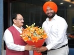 Newly joined BJP leader Ravneet Singh Bittu calls on party chief JP Nadda after joining the Bharatiya Janata Party (BJP) ahead of Lok Sabha elections 2024, at JP Nadda's residence in New Delhi on Tuesday. (OfficeofJPNadda-X)