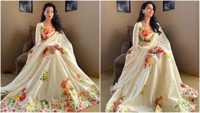 Nora Fatehi is a total stunner who nails fashion like a pro. Whether it's a sartorial saree or a chic jumpsuit, the actress can pull off any look to perfection. The stylish diva is currently showcasing her love for ethnic wear and her back to back glamorous looks are sure to inspire your ethnic wardrobe. Just a day ago, she wowed her fans in a stunning pink kurta ensemble and this time around, she is turning heads in a mesmerising ivory anarkali suit adorned with an enchanting floral pattern. Let's decode her chic look and take some style notes. (Instagram/@norafatehi) Nora Fatehi is a total stunner who nails fashion like a pro. Whether it's a sartorial saree or a chic jumpsuit, the actress can pull off any look to perfection. The stylish diva is currently showcasing her love for ethnic wear and her back to back glamorous looks are sure to inspire your ethnic wardrobe. Just a day ago, she wowed her fans in a stunning pink kurta ensemble and this time around, she is turning heads in a mesmerising ivory anarkali suit adorned with an enchanting floral pattern. Let's decode her chic look and take some style notes. (Instagram/@norafatehi)