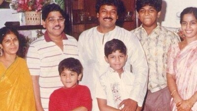 Chiranjeevi and Ram twine in white outfits in this throwback picture. Chiranjeevi and Ram twine in white outfits in this throwback picture.