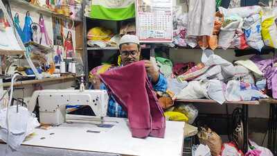 A tailor working overtime ahead of Eid in Prayagraj. (Anil Kumar Maurya/HT) A tailor working overtime ahead of Eid in Prayagraj. (Anil Kumar Maurya/HT)