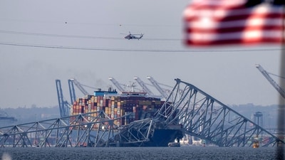 Netizens have found uncanny similarities between the Baltimore bridge collapse and a scene from Leave the World Behind (AP/PTI) (AP) Netizens have found uncanny similarities between the Baltimore bridge collapse and a scene from Leave the World Behind (AP/PTI) (AP)