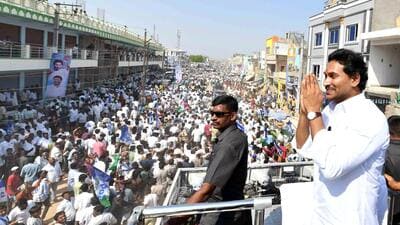 Andhra Pradesh CM YS Jagan Mohan Reddy greets the gathering at the start of the ‘Memanta Siddham’ bus yatra, at Idupulapaya in YSR District on Wednesday. (ANI) Andhra Pradesh CM YS Jagan Mohan Reddy greets the gathering at the start of the ‘Memanta Siddham’ bus yatra, at Idupulapaya in YSR District on Wednesday. (ANI)