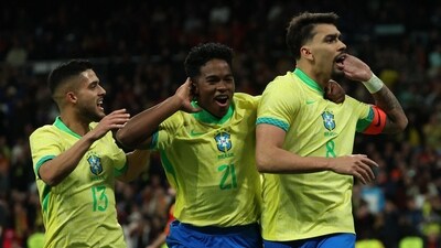 Brazil's midfielder Lucas Paqueta (R) celebrates scoring his team's third goal during the international friendly football match against Spain (AFP) Brazil's midfielder Lucas Paqueta (R) celebrates scoring his team's third goal during the international friendly football match against Spain (AFP)