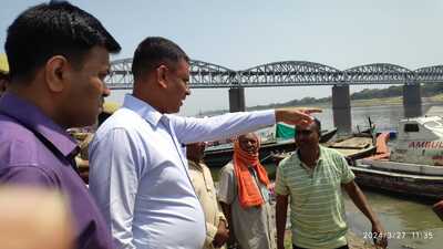District magistrate S Rajalingam and additional commissioner of police (law and order) S Channappa inspecting the route in Varanasi on Wednesday. (HT Photo) District magistrate S Rajalingam and additional commissioner of police (law and order) S Channappa inspecting the route in Varanasi on Wednesday. (HT Photo)